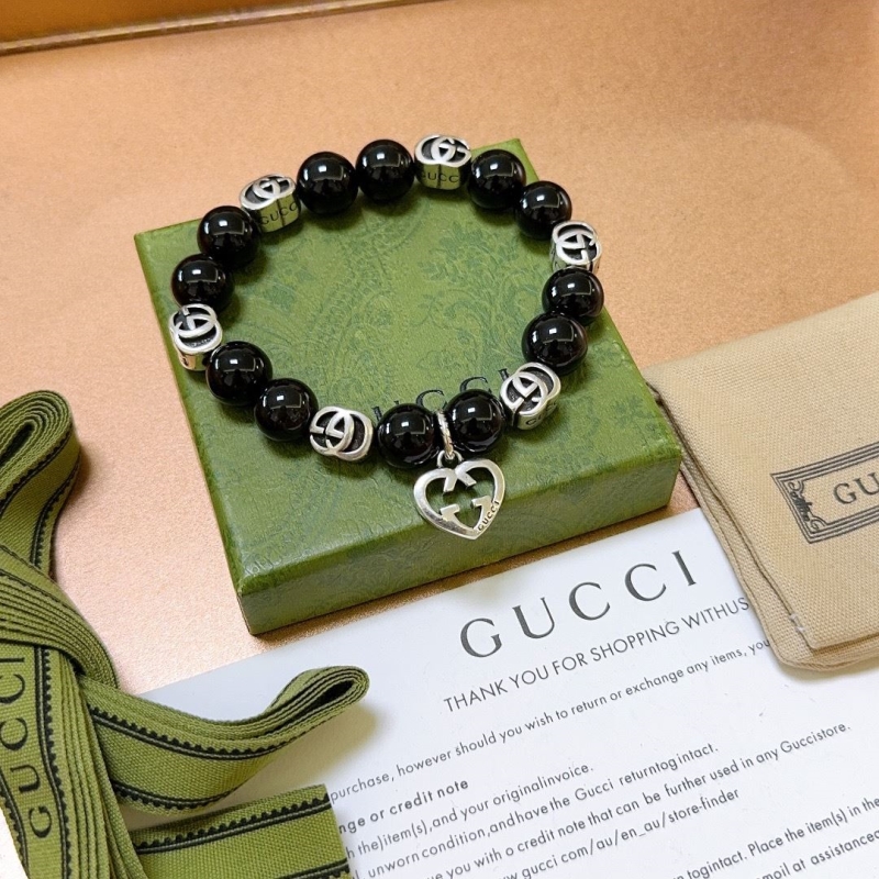 G*u*i bracelets